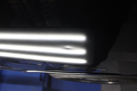 ジムニーリアタイヤ上のへこみ修理、デントリペアで心もスッキリ